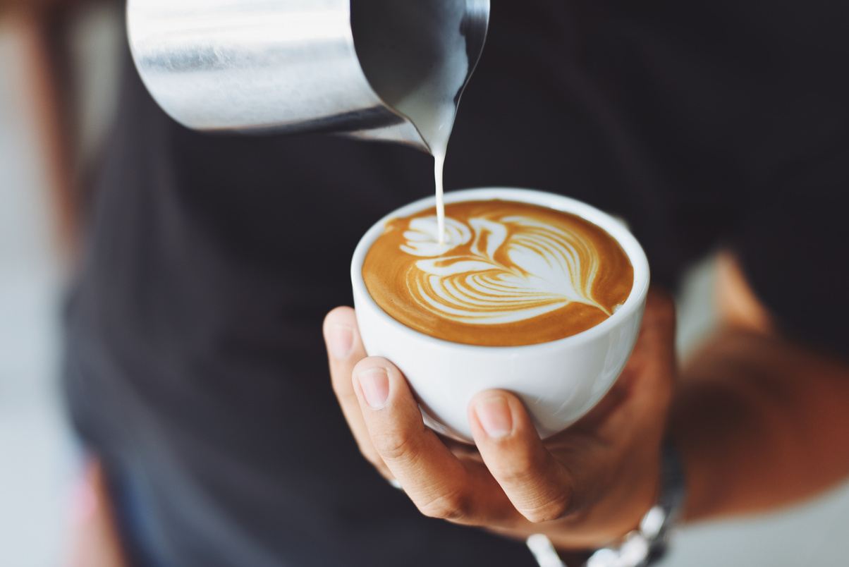 Latte art being poured